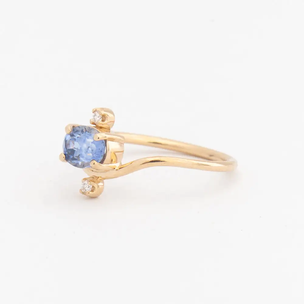 0.94 ct Oval Sapphire and Diamond Nestled Ring